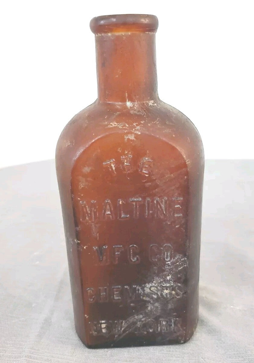Antique medicine bottle THE MALTINE  MF'G. CO. CHEMISTS  NEW YORK amber color