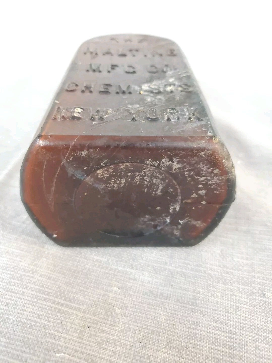 Antique medicine bottle THE MALTINE  MF'G. CO. CHEMISTS  NEW YORK amber color