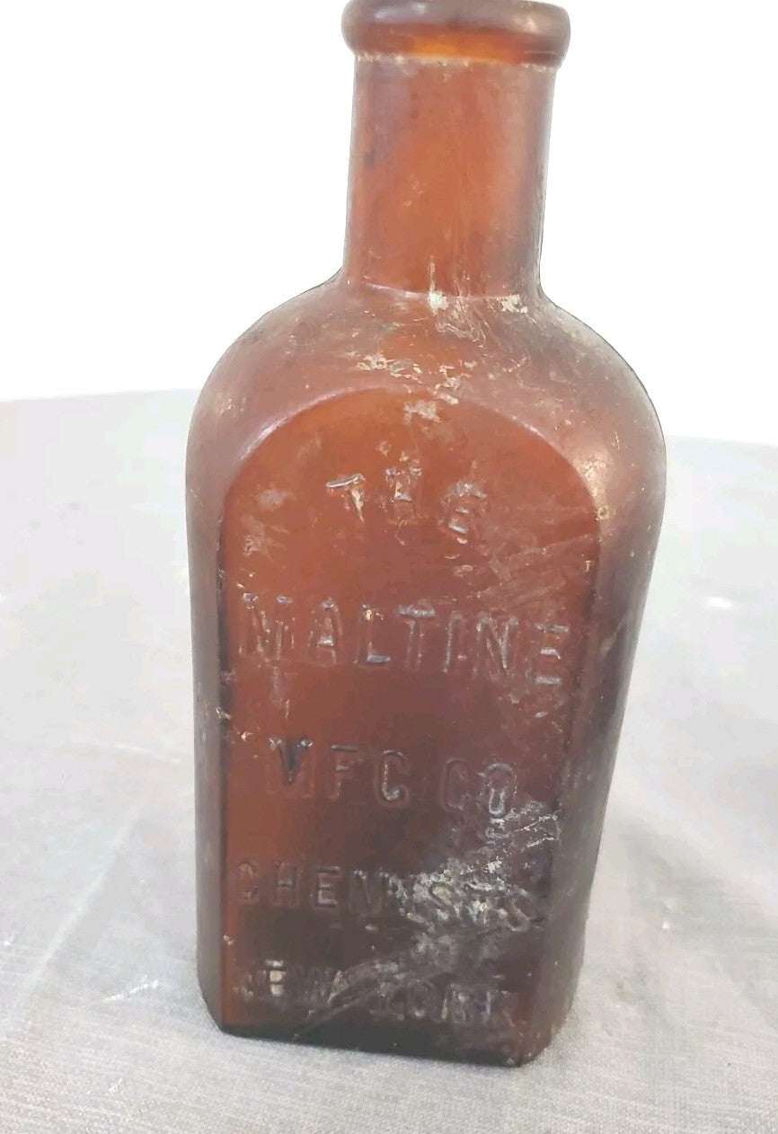 Antique medicine bottle THE MALTINE  MF'G. CO. CHEMISTS  NEW YORK amber color